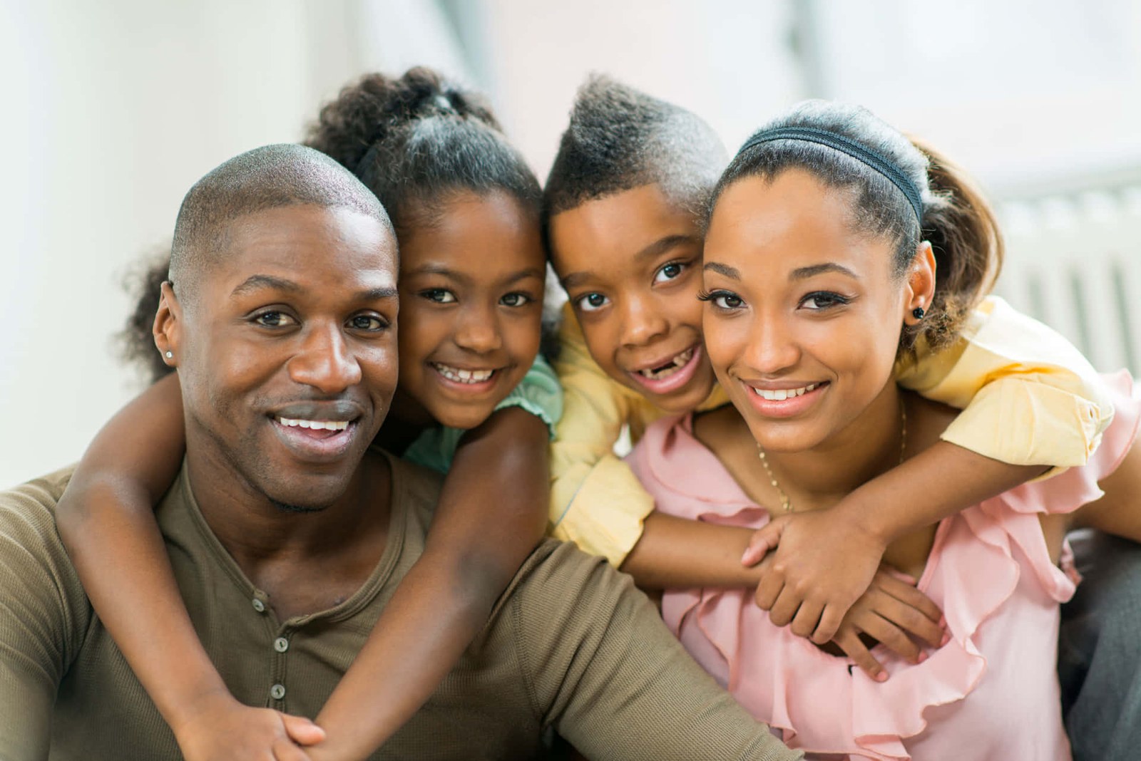 Happy family protected by insurance
